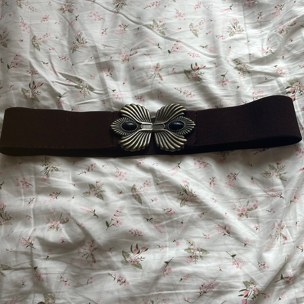 Brown belt with pendent details